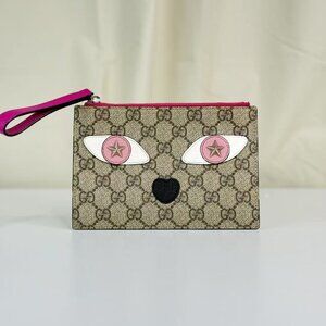 Gucci GG Logo Supreme Clutch with Eye Design & Pink Trim